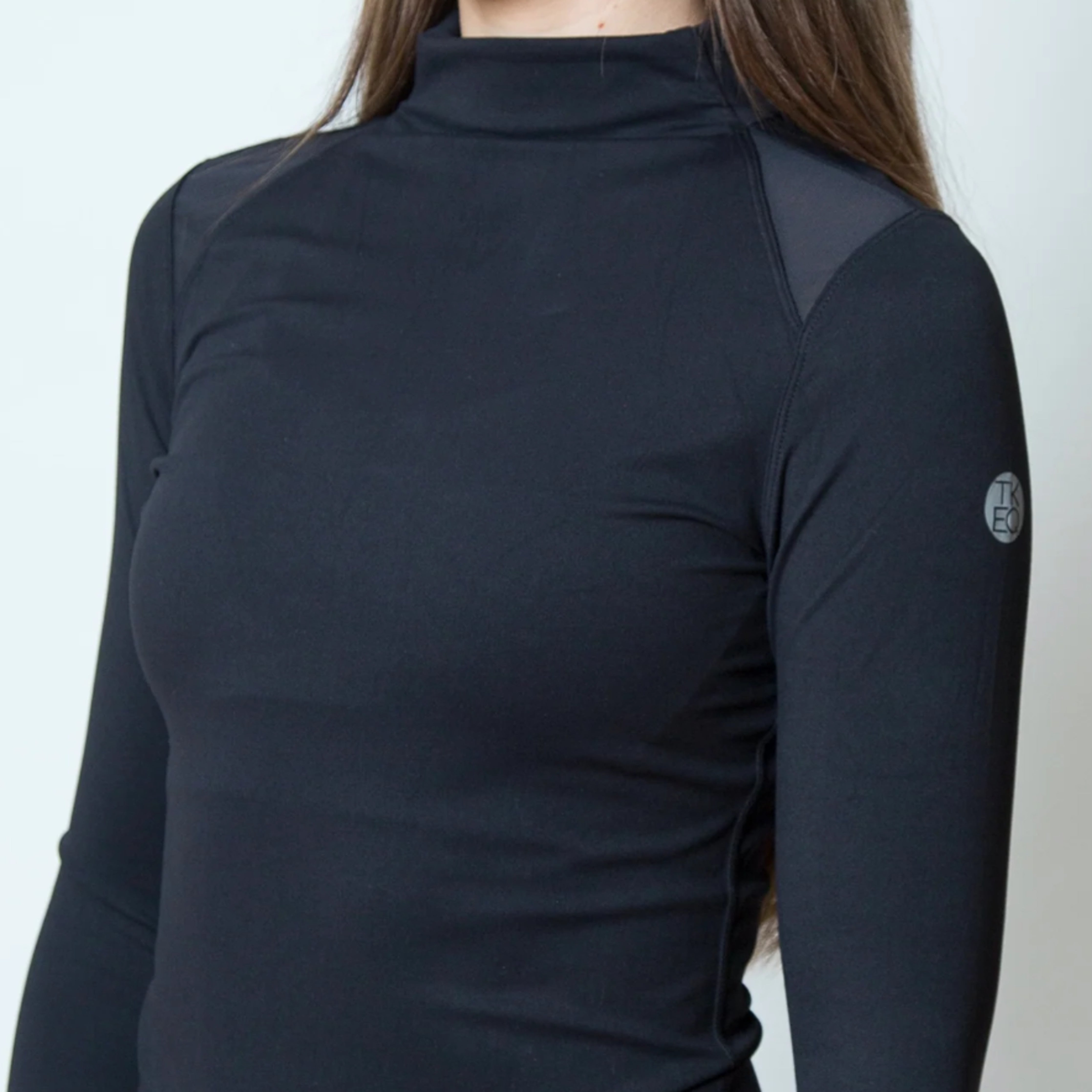 TKEQ Chloe High Collar Tech Top